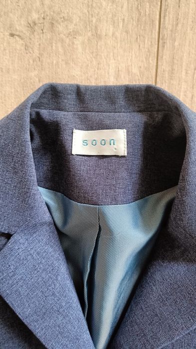 Żakiet z ażurowym motywem