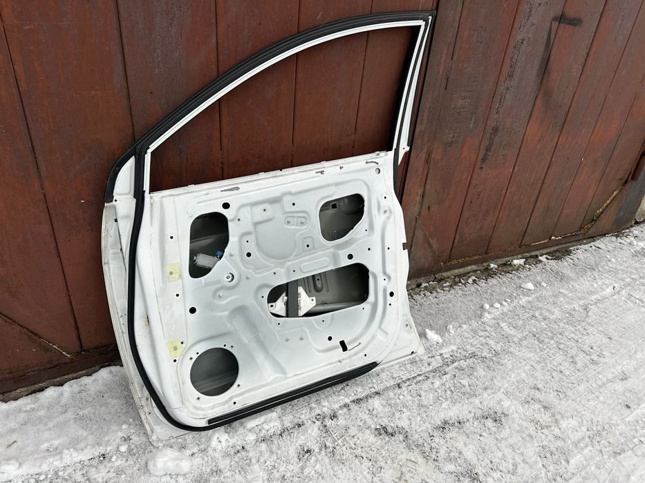 Дверка двері кляпа Chevrolet Captiva