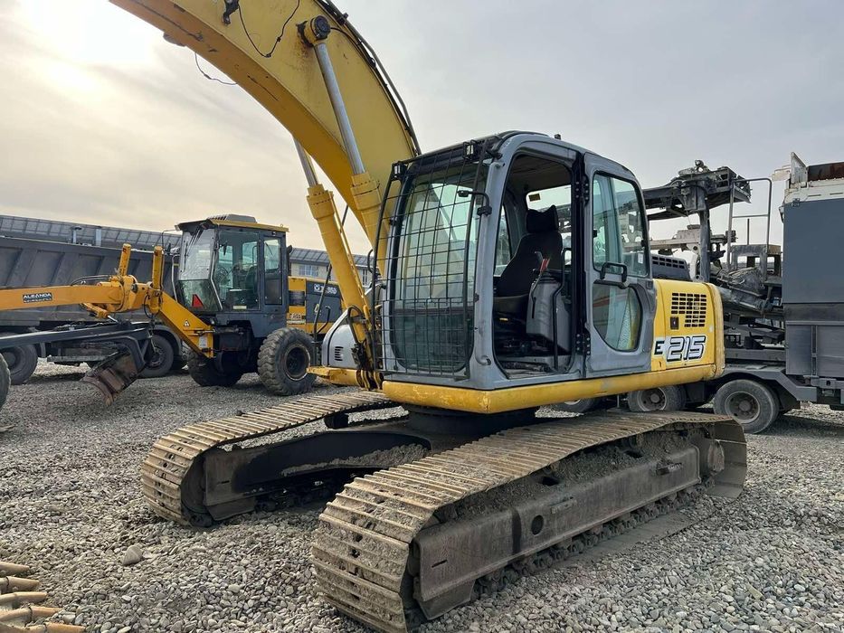 Екскаватор new holland