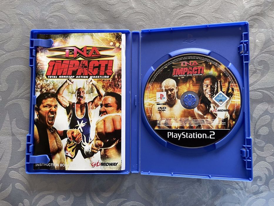 TNA Impact (PS2)64284556744194122