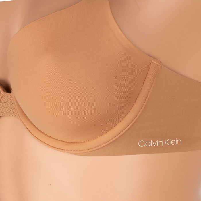 Biustonosz Calvin Klein Perfectly Fit Flex 80C nude demi nowy