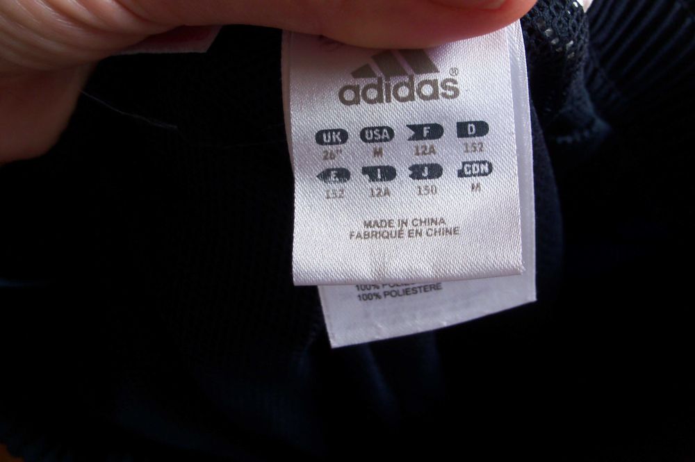 ADIDAS granatowe spodnie dresowe na podszewce chłopięce rozm.146-152