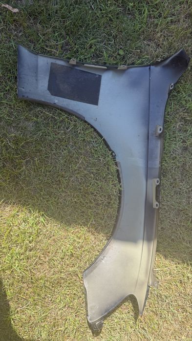 Blotnik lewy Audi A4 B8 Lift