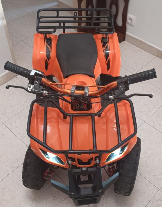Mini moto 4 laranja elétrica em muito bom estado
