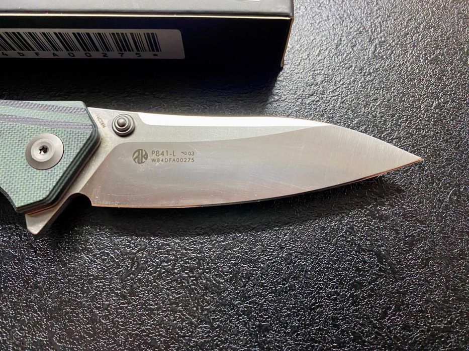 Ruike P841-L, Sandvik 14C28N, G10, підшипники. Оригінал