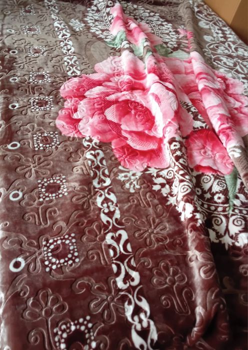 Ковдра або плед тепле