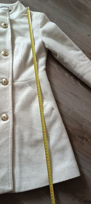 Kremowy płaszcz rozmiar 34