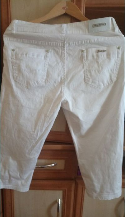 Białe spodnie XL