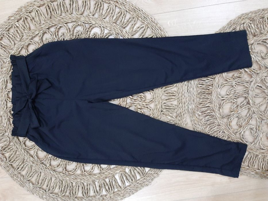 2 par Calças beje e pretas