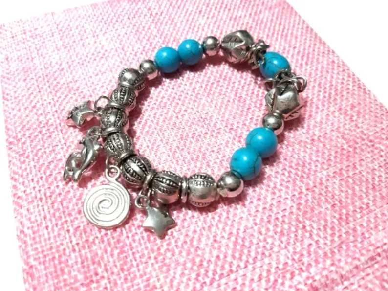 Pulseira de 10mm Extensível com Amuletos