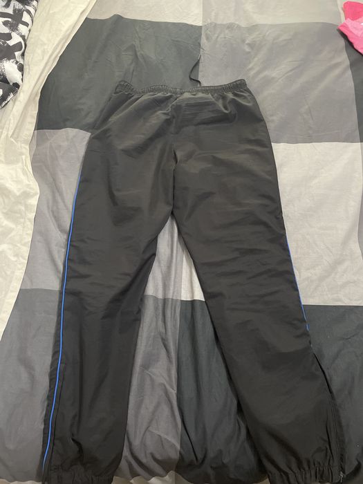 calças lacoste sport pretas e azuis