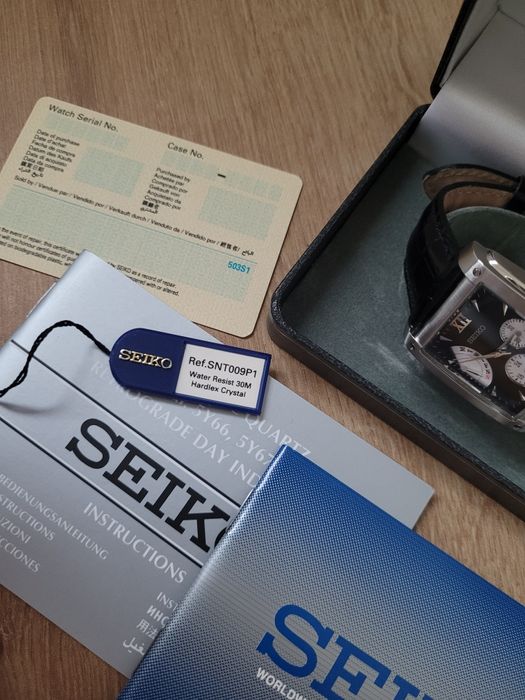 SEIKO SNT009P1 tank retrograde reverse panda NOWY