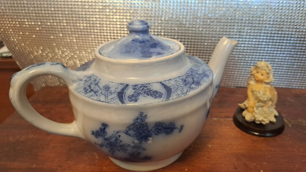 Bule, porta guardanapos e travessa