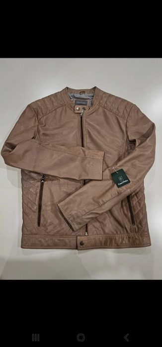 Casaco de pele homem novo nunca usado como se vê nas fotos...e de pele