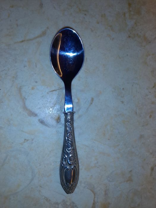 Colher com cabo de prata