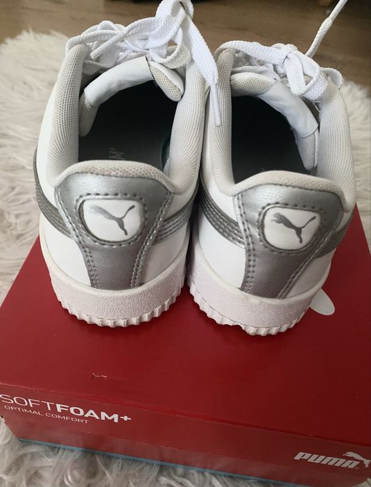 Білі кросівки puma