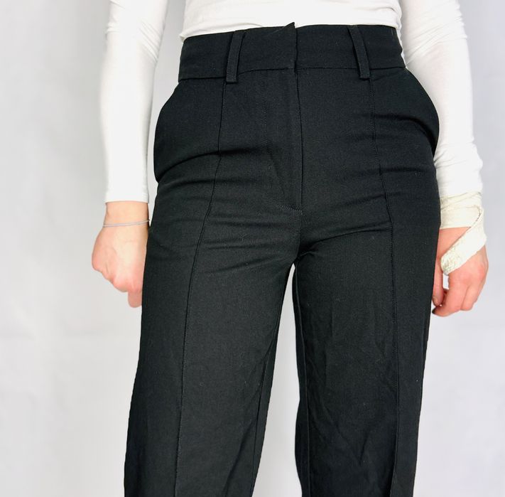 Czarne spodnie z szeroką nogawką XS 34