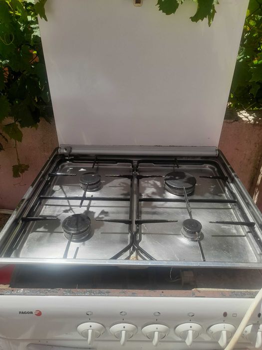 Fogão  looktop com marcas de uso mais funciona perfeitamente