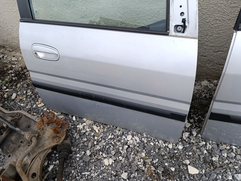 Drzwi lewe prawe przód Hyundai Matrix 2008