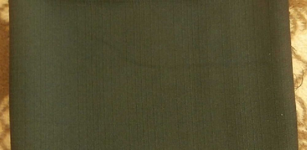 Tkanina- elano argona czarna w delikatna wytlaczaną kratke - /poz.46/