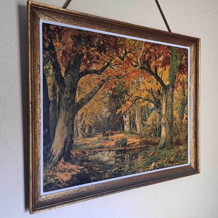 Quadro com moldura dourada
