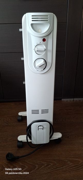 Grzejnik olejowy 1500 W,jak nowy