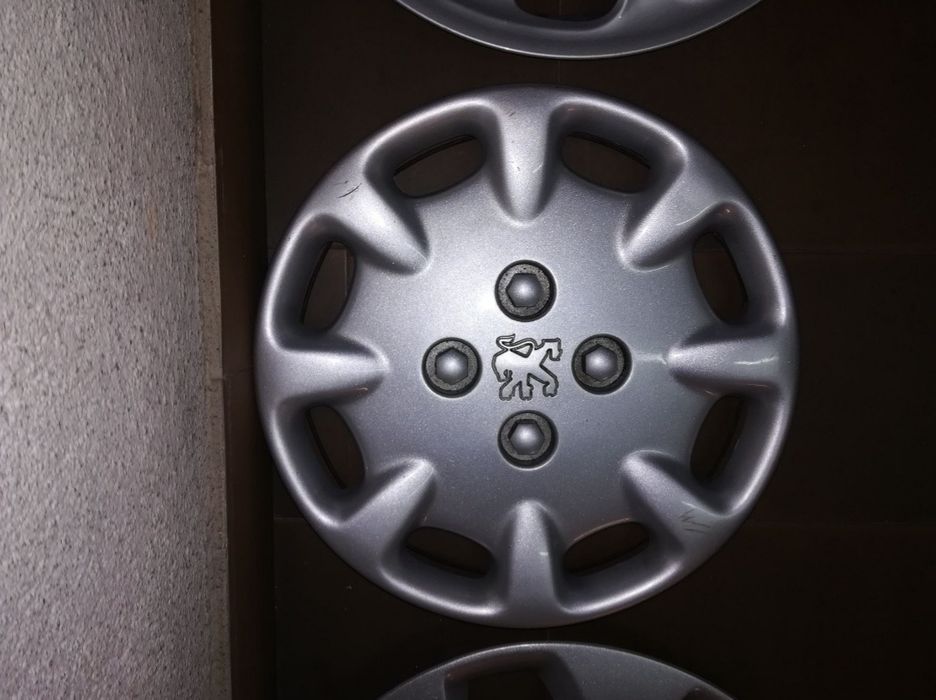 Tampão Peugeot jante 13