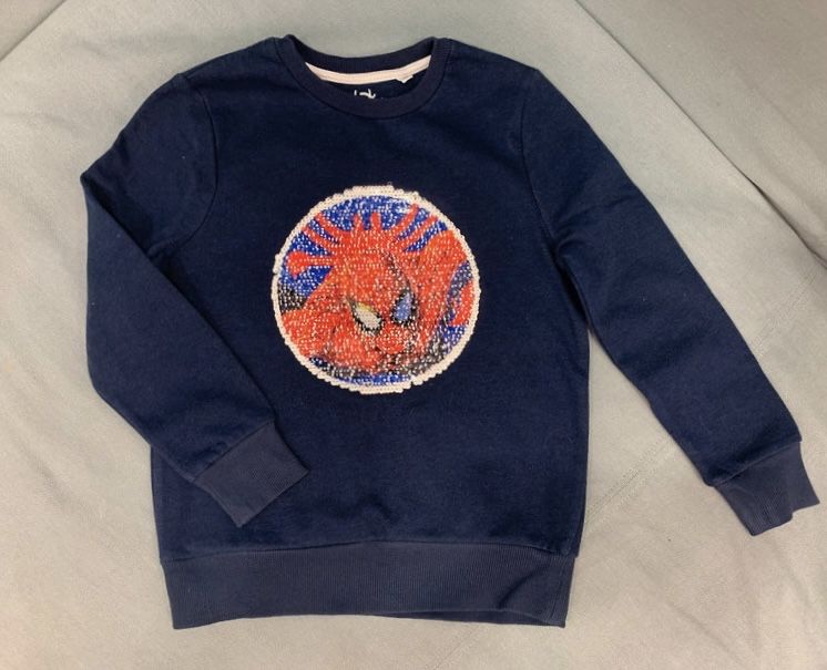 Granatowa bluza chłopięca cekiny Spiderman C&A 128/134