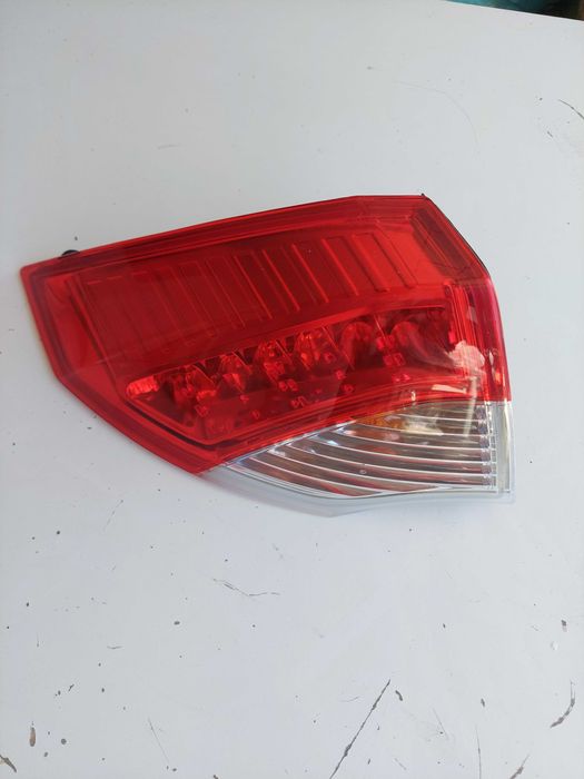 farolim t esq ext Renault laguna