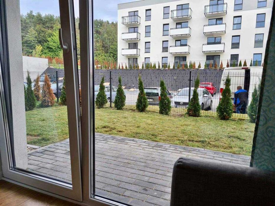 wynajmę nowe mieszkanie/apartament dwupokojowy z DUŻYM OGRODKIEM i MIEJSCEM PARKINGOWYM