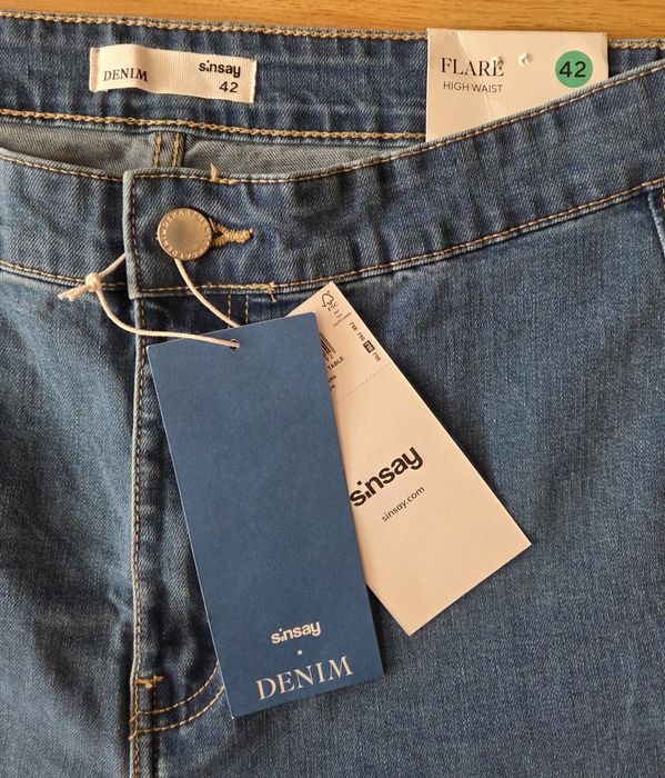 Nowe dżinsy dzwony Sinsay L/XL
