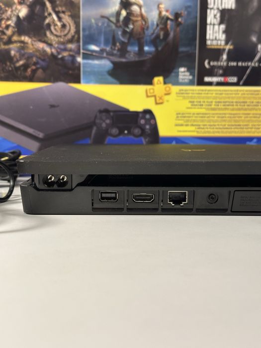 PlayStation 4 Slim 1 TB + диски з іграми