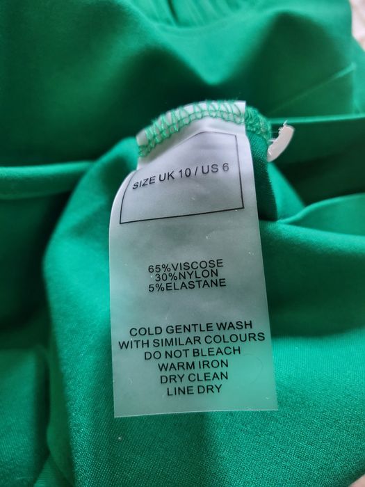 Бомбезный брендовый зелёный бандажный комбинезон Maniere de Voir р. S-