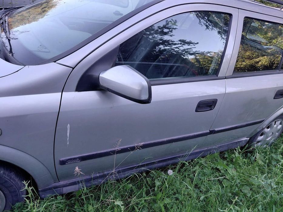 części OPEL ASTRA II G 1.4 16V benzyna kombi 1999r. DRZWI przód prawe lewe TYŁ prawe lewe Z147