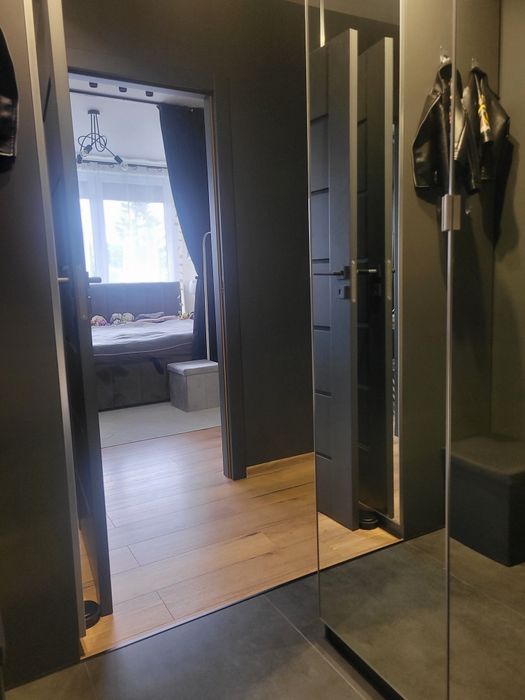 Przestronne mieszkanie z ogrodem i dwoma miejscami parkingowymi