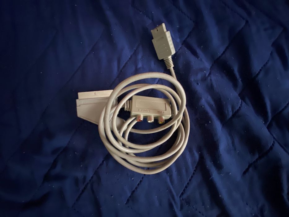 (LER DESCRIÇÃO)Várias Playstation 1, jogos e comandos A FUNCIONAR