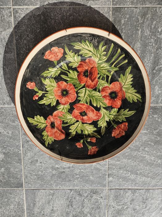 Pratos de barro decorativos