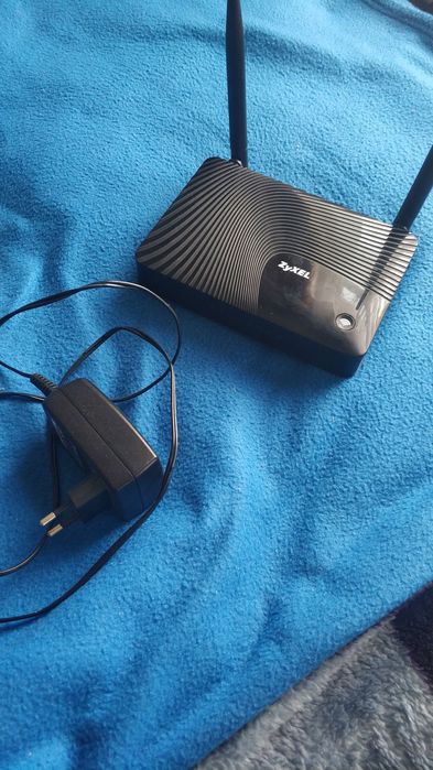 Комплект WiFi Роутер Zyxel Keenetic dsl + 3g модем Huawei 3131 , 21.6 Мбит