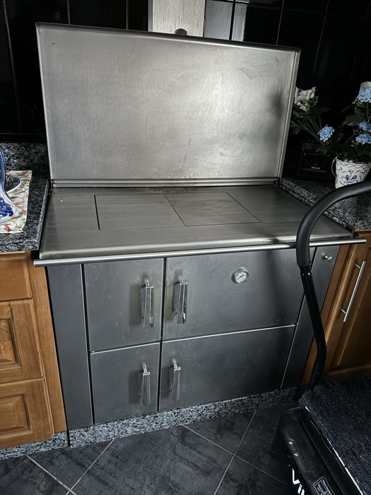 Fogao em inox a lenha numca usado