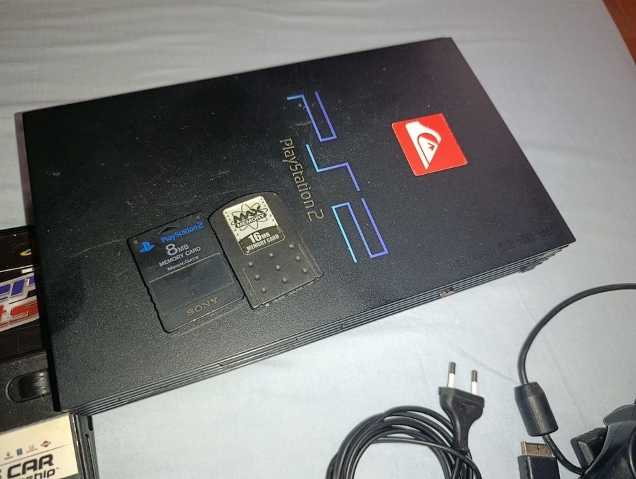 Ps2 com jogos e dois comandos originais