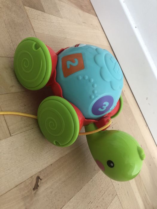 Fisher-Price, jeżdżący żółwik ze sznurkiem