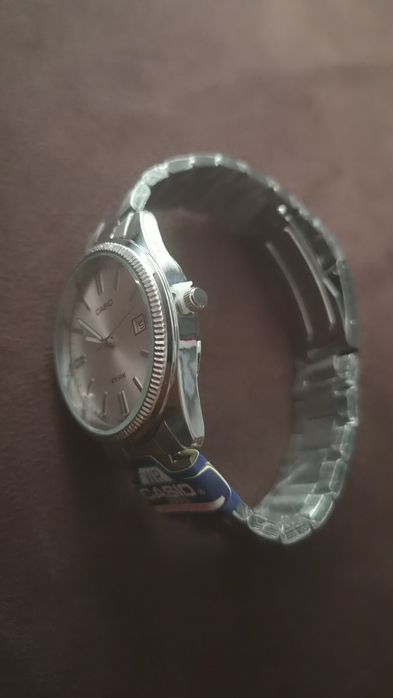 Relógio Casio MTP-1302 - cinza e branco