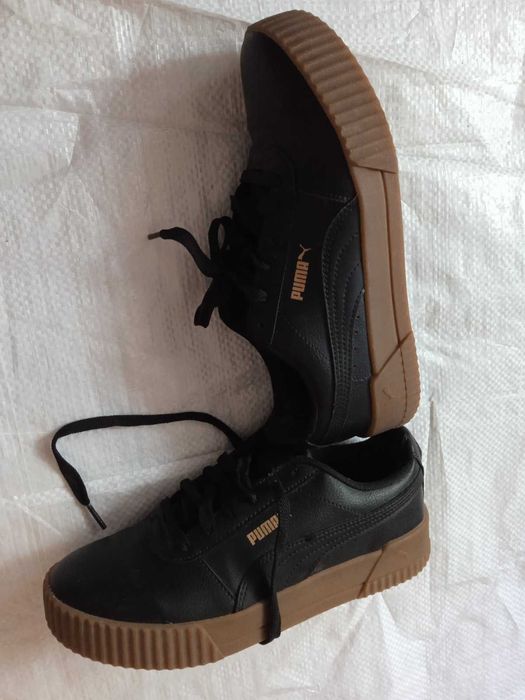 продам чорні жіночі шкіряні кросівки Пума практично нові