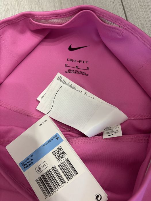 Рожеві лосини Nike