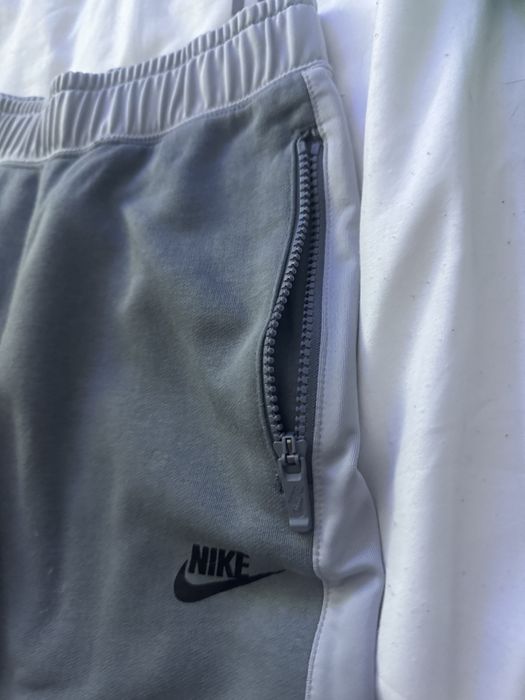 Calcas da nike cinzentas quase novas