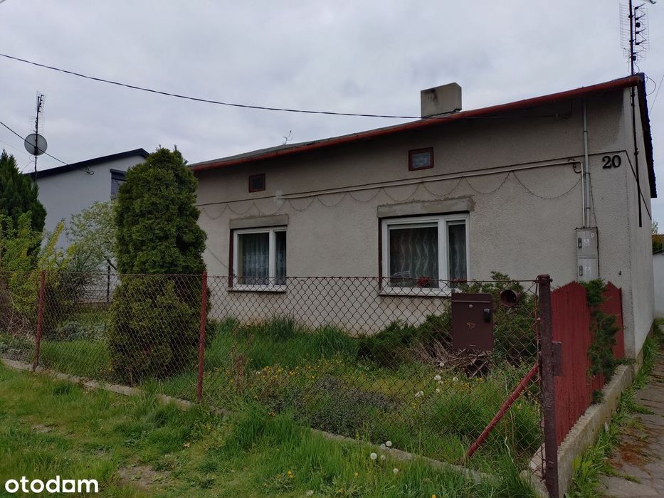 Dom z garażem i budynkiem gospodarczym. Działka 1045m2.