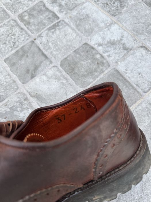Sapatos de forcado em pele