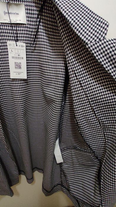 Casaco com padrão da Stradivarius