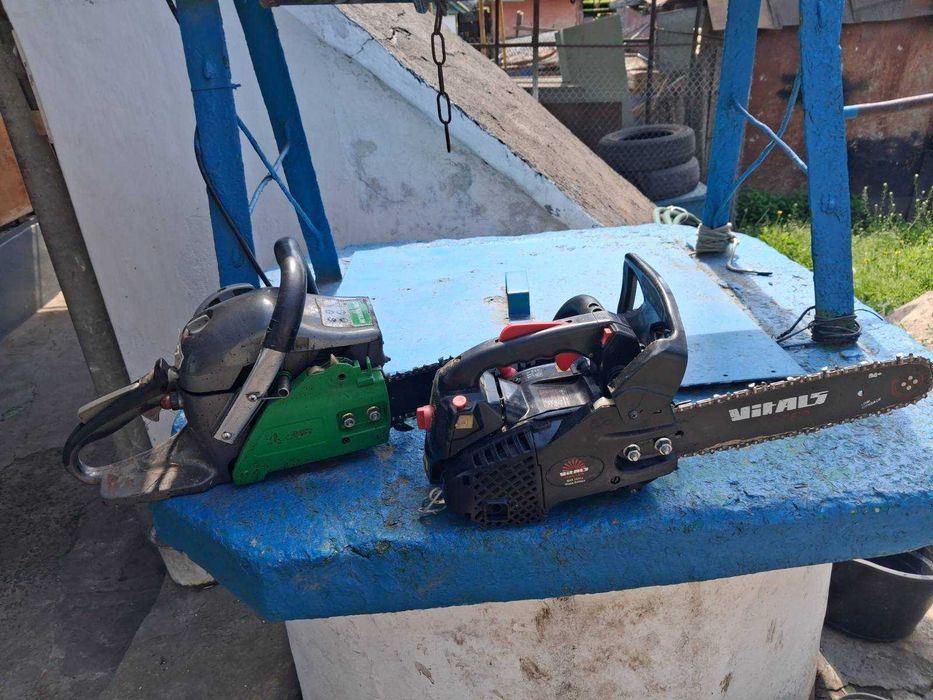Бензопили Grunhelm GS5200M і Vitals