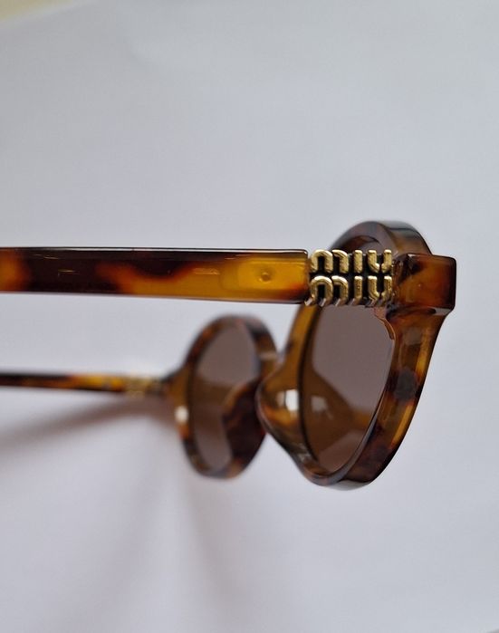 Сонцезахисні окуляри MIU MIU